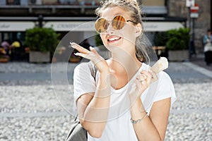 Stylish girl eating ice cream.