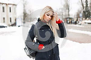 Stylish glamorous young model girl in a fashion winter coat