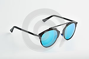 Stylish glasses with blue tinted mirror