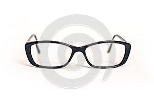 Stylish glasses in a plastic black frame on a white background with dioptres