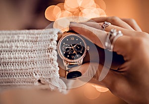 Stylish gold watch on woman hand