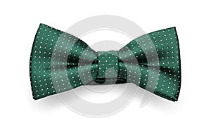 Stylish green bow tie with polka dot pattern on white background, top view