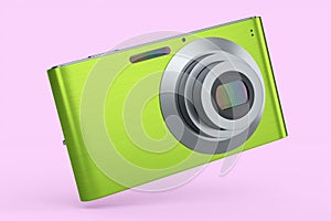 Stylish greeb compact pocket digital camera isolated on pink background