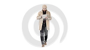 Stylish guy connected on internet with tablet on white background.