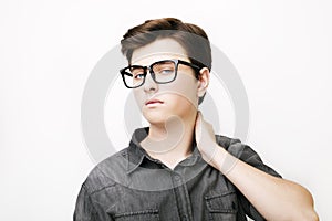 Stylish handsome young man posing on white background
