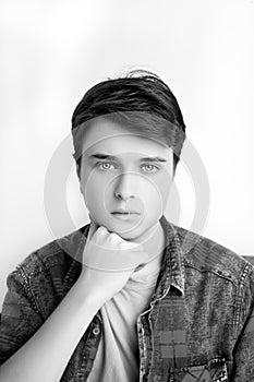 Stylish handsome young man posing on white background