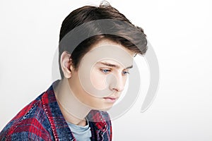 Stylish handsome young man posing on white background