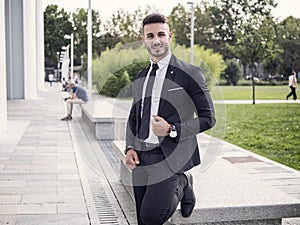 Stylish handsome young man wearing business suit