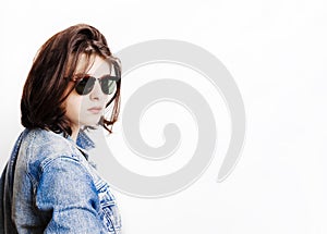 Stylish handsome young man,wearing sunglasses, posing on white background