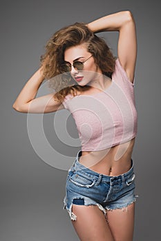 Stylish hipster fashion portrait of trendy casual young woman