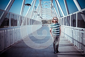 Stylish hipster model with long red hair and beard lifestyle