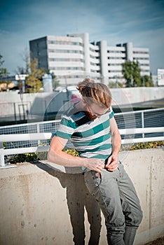 Stylish hipster model with long red hair and beard lifestyle