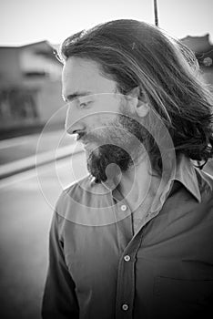 Stylish hipster model with long red hair and beard lifestyle