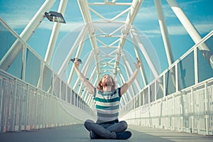 Stylish hipster model with long red hair and beard yoga