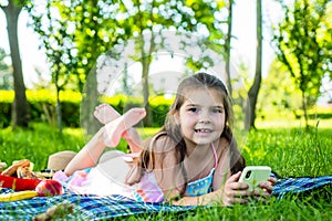 Stylish holidays begin with us. Little kid relax on green grass. Summer holidays. Vacation destination. Passive outdoor