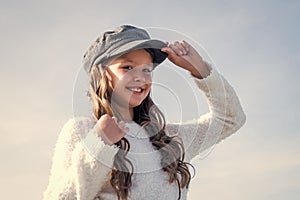 stylish kid wear trendy cap. seasonal autumn fashion look. teenage girl in good mood. happy childhood. beauty and