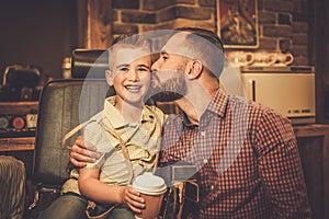 Stylish little boy and his father