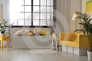 Stylish living room interior with modern furniture near