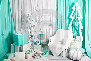 Stylish living room or studio Christmas interior in mint and tiffany colors