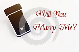 Stylish luxury ring, will you marry me text, greeting card conce