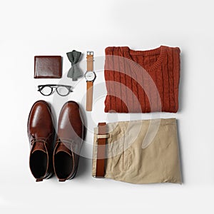 Stylish male autumn outfit and accessories on white background. Trendy warm clothes