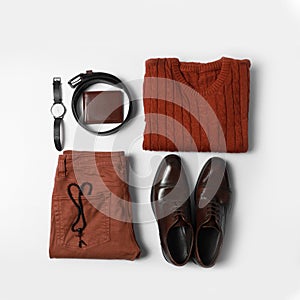 Stylish male autumn outfit and accessories on white background. Trendy warm clothes