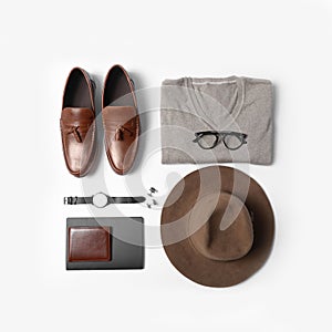 Stylish male autumn outfit and accessories on white background. Trendy warm clothes