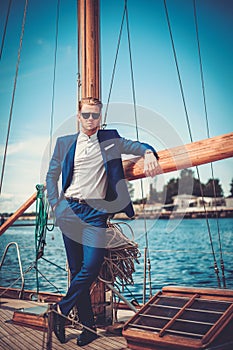 Stylish man on a luxury regatta