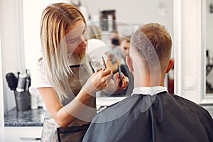 Stylish man sitting in a barbershop