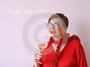 stylish mature senior woman in red blouse with glass
