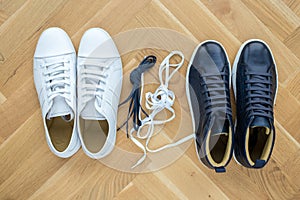 Stylish men`s shoes. men fashion still life. different boots, sneakers