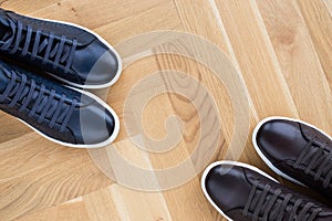 Stylish men`s shoes. men fashion still life. different boots, sneakers