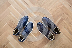 Stylish men`s shoes. men fashion still life. different boots, sneakers