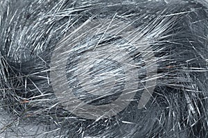 Stylish metallic silver tinsel threads also called lametta