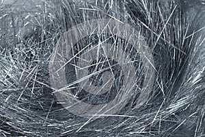 Stylish metallic silver tinsel threads also called lametta