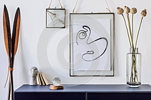 Stylish, modern living room with mock up poster frame.