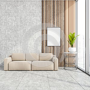 Stylish modern office room interior in skyscraper building with design leather couch, white mock up framed poster, tile ceramic