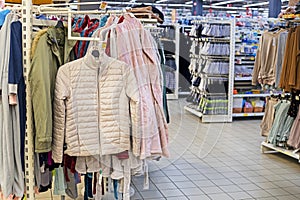 stylish modern outerwear in a supermarket.