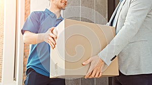 In Stylish Modern Urban Office Area Delivery Man Delivers Postal Package to a Male Business Custom