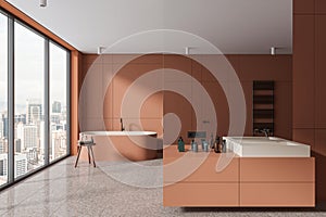 Stylish orange bathroom interior with sink and tub, accessories and window