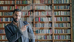 Stylish Oriental Young Man In Library.