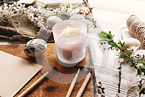 Stylish painted easter egg black and white colors at rustic wood