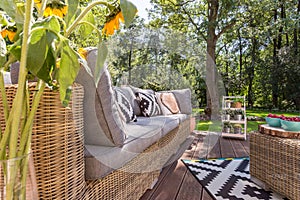 Stylish patio with rattan furniture