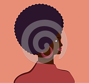 Stylish profile portrait of an African woman. Head of dark skin woman with voluminous hairstyle. Vector flat illustration