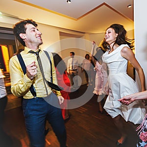 Stylish retro bride and groom dancing first wedding dance swing