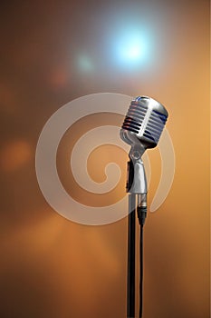 Stylish retro microphone on a colored background