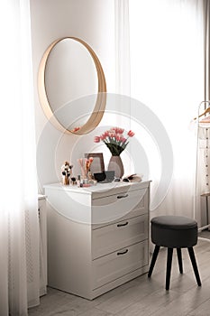 Room interior with dressing table and mirror