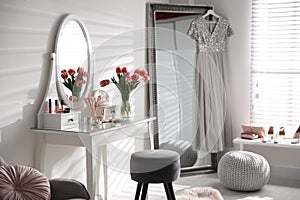 Room interior with elegant dressing table and mirror