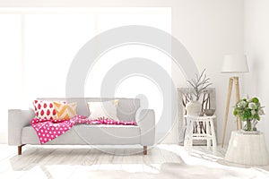Stylish room in white color with sofa. Scandinavian interior design