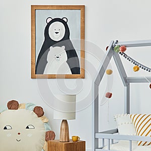 Stylish scandinavian child`s room interior with mock up poster frame, creative bed, wooden cube, lamp, plush and wooden toys.